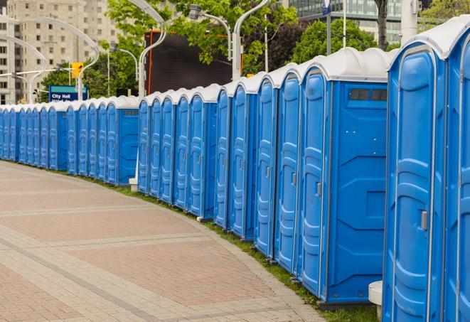 a row of portable restrooms at a fairground, offering visitors a clean and hassle-free experience in beachcity